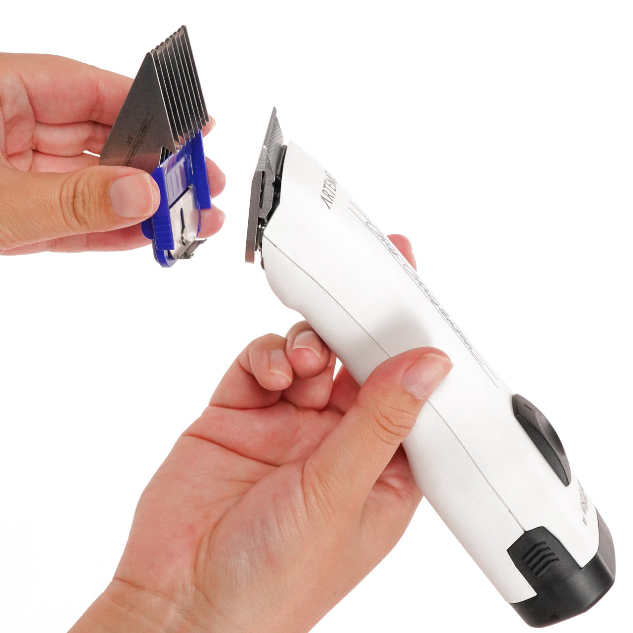 Side view of attaching a Chris Christensen Artemis Clipper Comb to Artemis Clipper